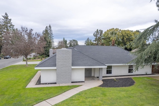 ranch-style house with a front yard