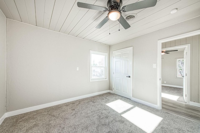 133 W Birch Ave, Pinedale, CA 93650 - unfurnished bedroom featuring carpet flooring, wooden ceiling, and a ceiling fan