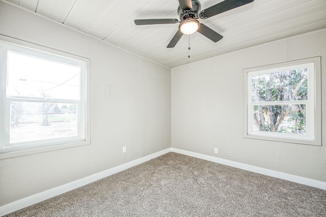 133 W Birch Ave, Pinedale, CA 93650 - spare room with healthy amount of natural light, carpet, a ceiling fan, and wooden ceiling
