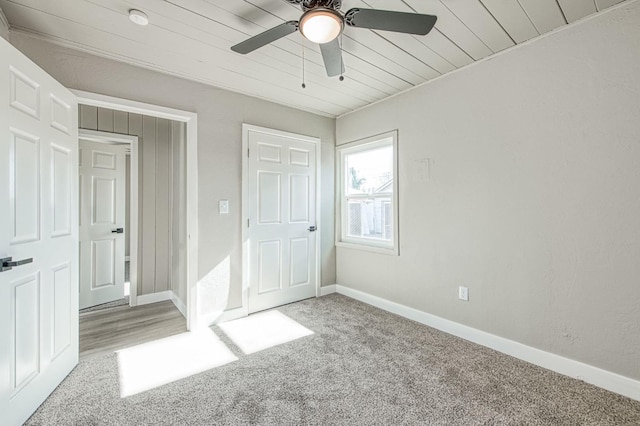133 W Birch Ave, Pinedale, CA 93650 - unfurnished bedroom featuring carpet floors, wooden ceiling, and a ceiling fan