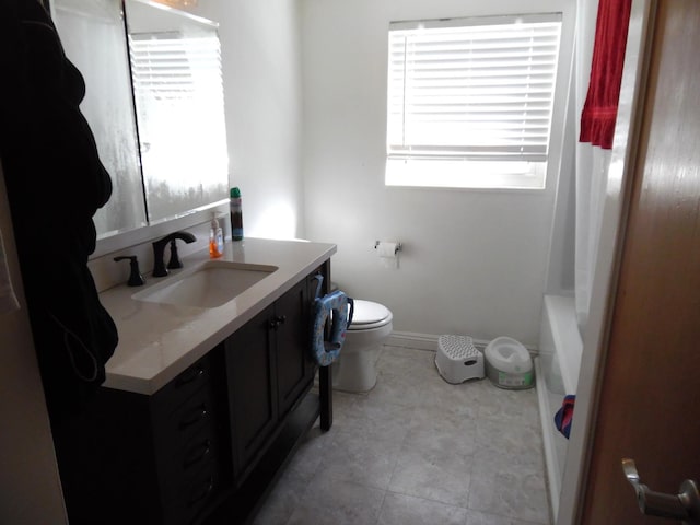 full bathroom with shower / bath combination with curtain, vanity, and toilet