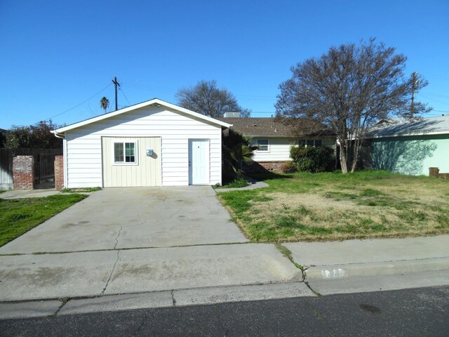 exterior space with a front yard