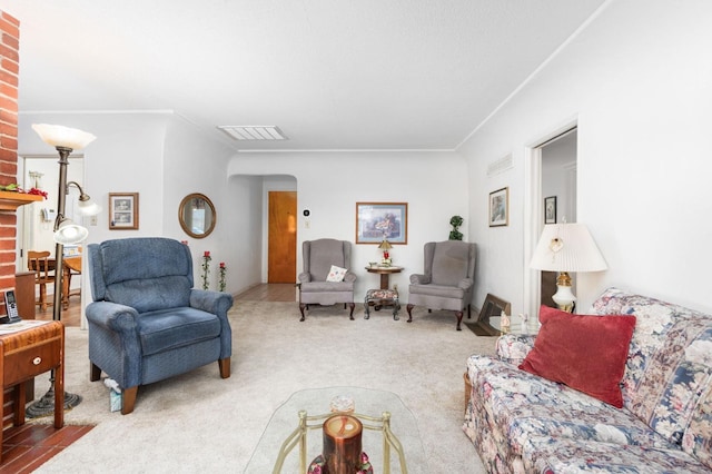 carpeted living room with crown molding