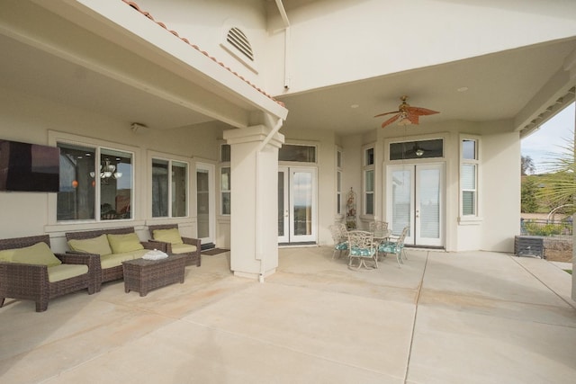 view of patio / terrace featuring french doors, ceiling fan, and outdoor lounge area