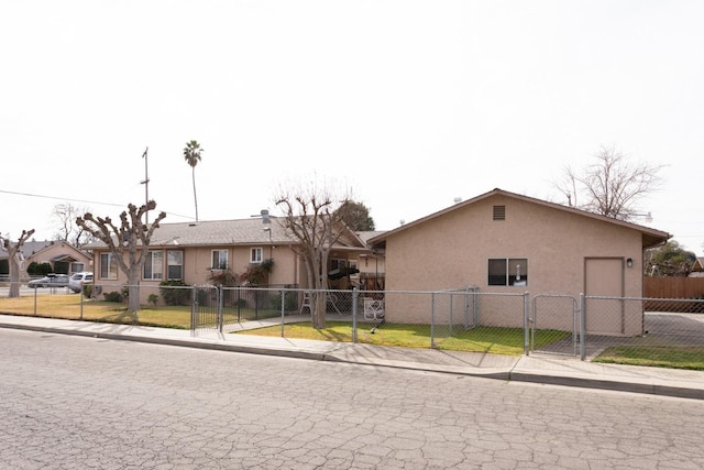 ranch-style house featuring a gate, fence, and stucco siding