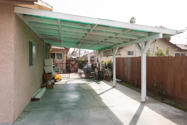 view of patio / terrace featuring fence