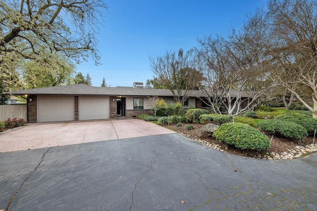 ranch-style house with a garage