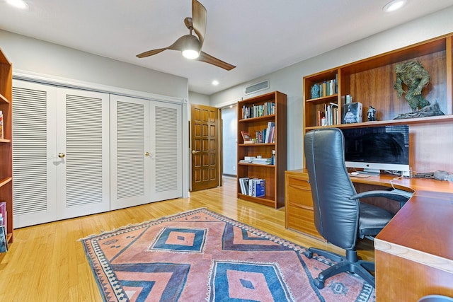 office area with ceiling fan and light wood-type flooring