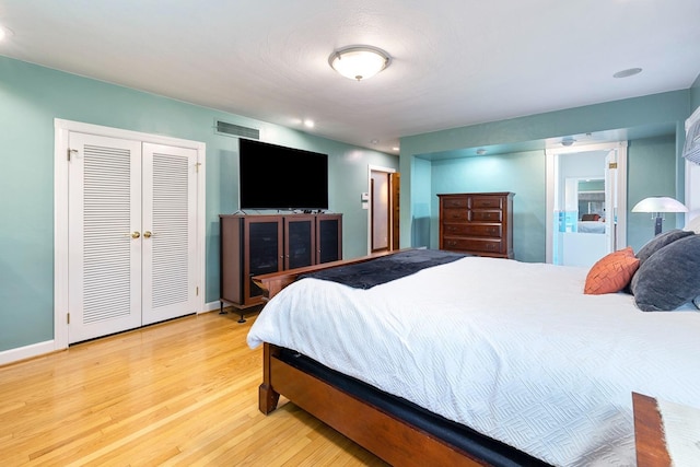 bedroom with wood-type flooring