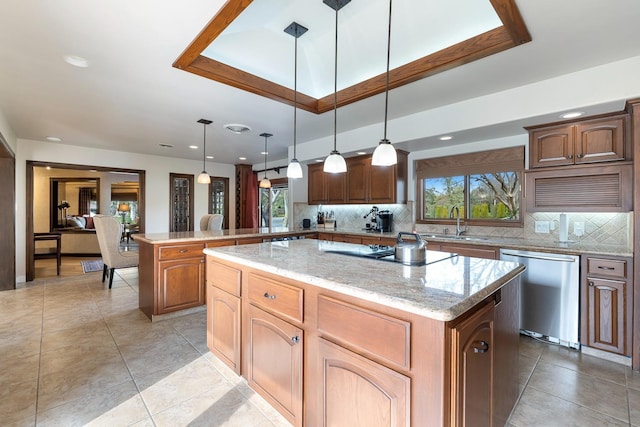 kitchen with a kitchen island, dishwasher, sink, hanging light fixtures, and black electric stovetop