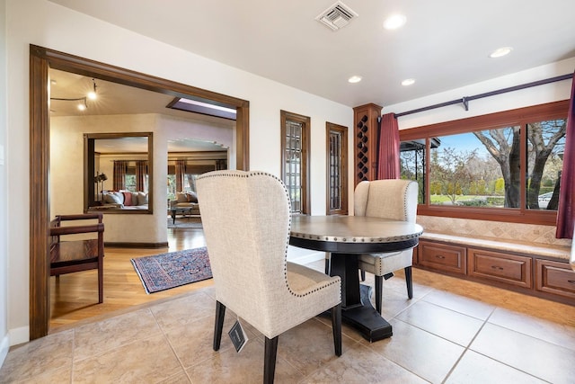 dining room with light tile patterned floors