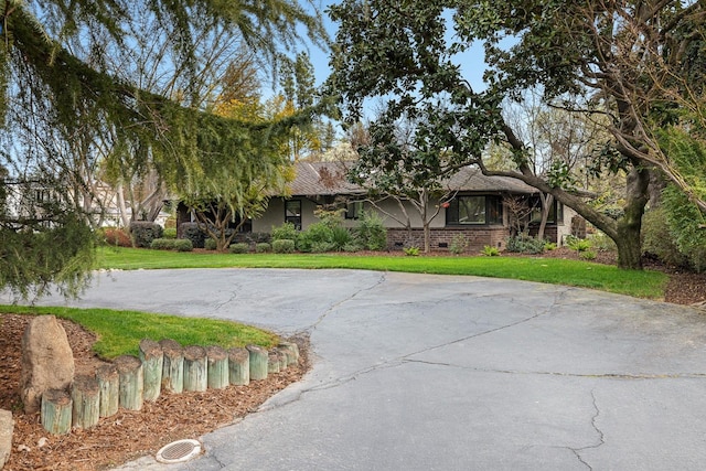 view of front of home with a front yard