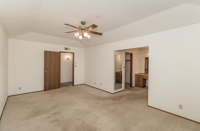 spare room with light carpet and ceiling fan