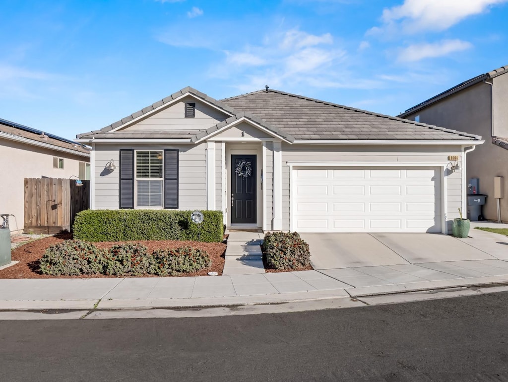 ranch-style home with a garage