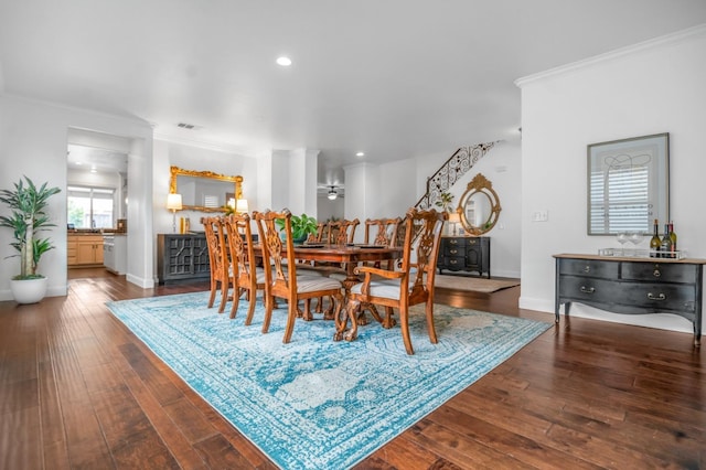 dining area featuring visible vents, ornamental molding, recessed lighting, wood-type flooring, and baseboards