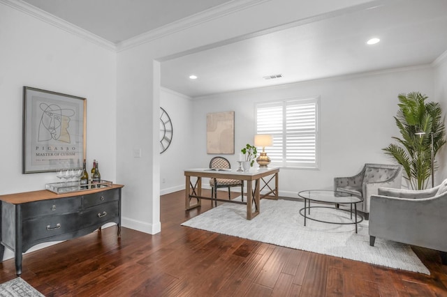 sitting room with visible vents, hardwood / wood-style floors, recessed lighting, crown molding, and baseboards