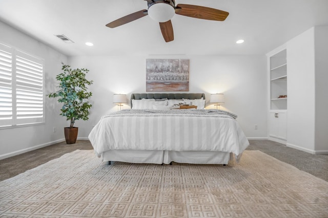 carpeted bedroom with visible vents, recessed lighting, and baseboards