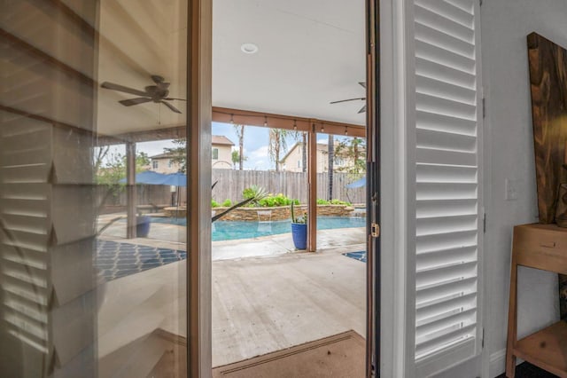 entryway featuring ceiling fan