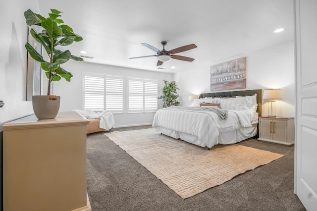 carpeted bedroom featuring visible vents, recessed lighting, baseboards, and a ceiling fan