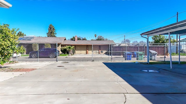 exterior space featuring a carport