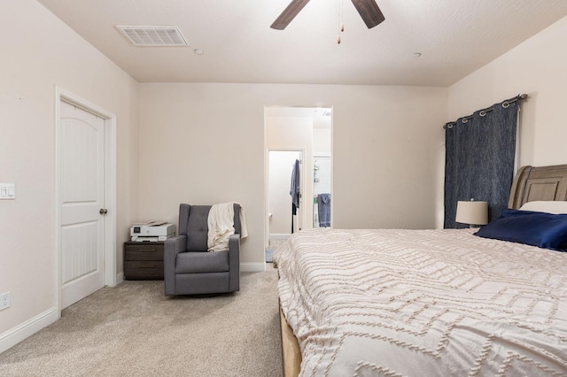 bedroom featuring light carpet and ceiling fan