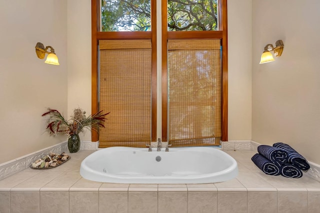 bathroom with tiled tub