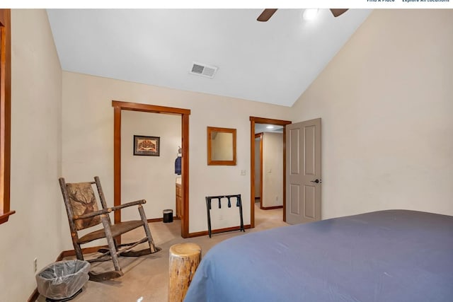 carpeted bedroom with vaulted ceiling and ceiling fan