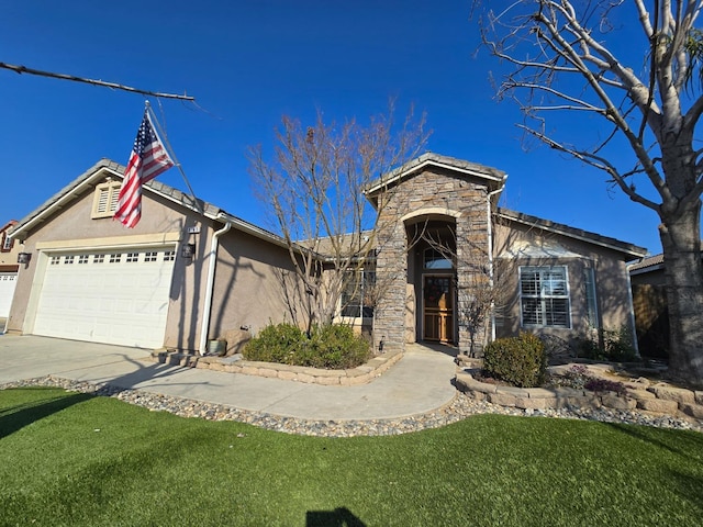 view of front facade with a garage and a front lawn