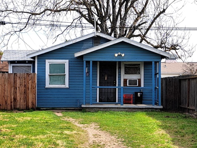 bungalow with a front lawn