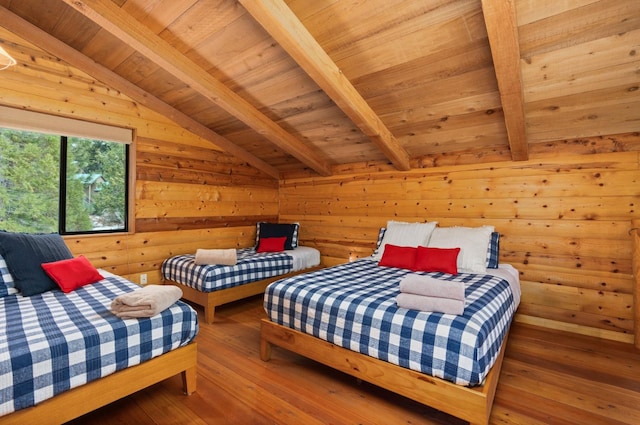 bedroom with lofted ceiling with beams, wood-type flooring, wooden walls, and wood ceiling