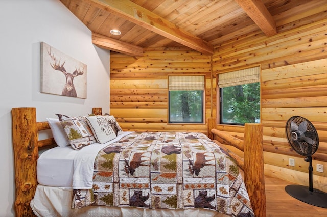 bedroom featuring beamed ceiling, hardwood / wood-style flooring, rustic walls, and wood ceiling