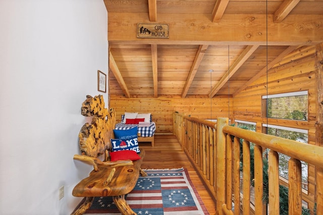 corridor with lofted ceiling with beams, dark wood-type flooring, wooden walls, and wood ceiling