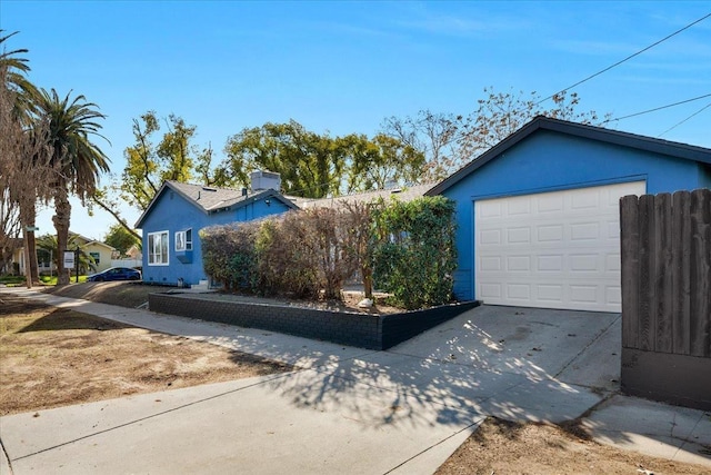 4491 E Nevada Ave, Fresno, CA 93702 - view of front of property with a garage