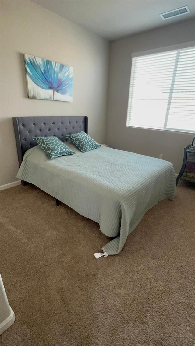 bedroom featuring carpet floors