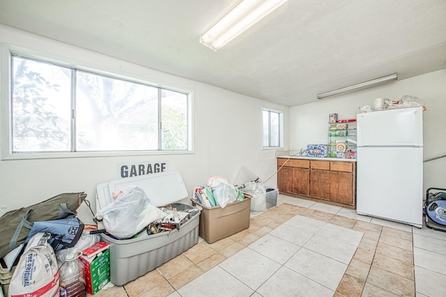 misc room featuring light tile patterned floors