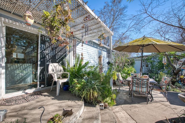 view of patio featuring a pergola