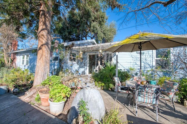 view of front of property with a patio area