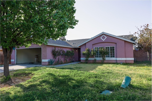 5140 E Belgravia Ave, Fresno, CA 93725 - single story home with a garage, stucco siding, and driveway