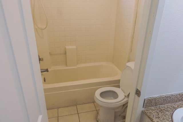 5140 E Belgravia Ave, Fresno, CA 93725 - bathroom featuring toilet, tile patterned floors, vanity, and bathing tub / shower combination