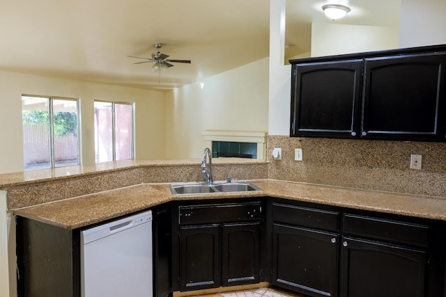 5140 E Belgravia Ave, Fresno, CA 93725 - kitchen with white dishwasher, a sink, ceiling fan, a peninsula, and dark cabinetry