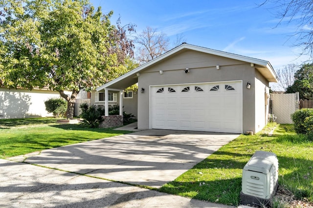 ranch-style house featuring a garage and a front yard