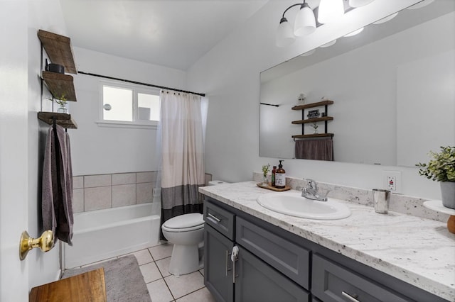 full bathroom with tile patterned flooring, vanity, toilet, and shower / bath combo with shower curtain