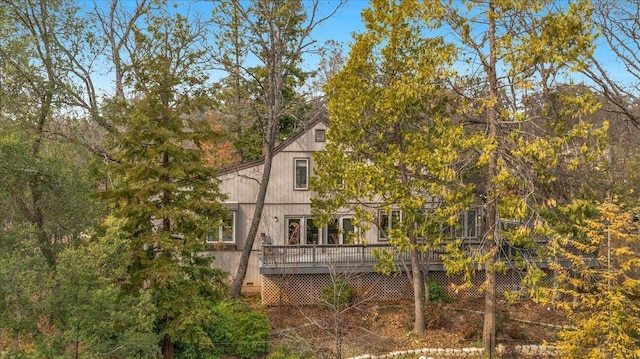 rear view of property with a deck