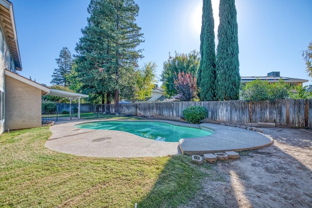 view of swimming pool featuring a lawn, a patio, a fenced backyard, and a fenced in pool