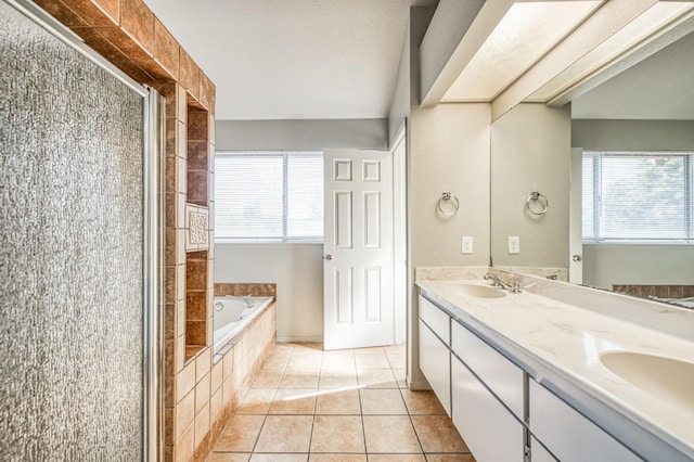 bathroom featuring double vanity, a sink, tile patterned flooring, a shower stall, and a bath