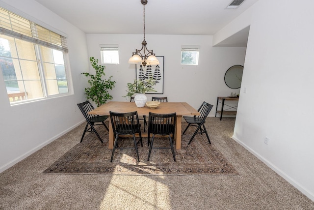 view of carpeted dining room