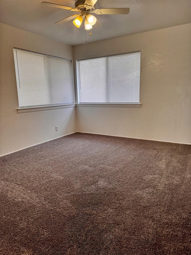 empty room with carpet floors and ceiling fan