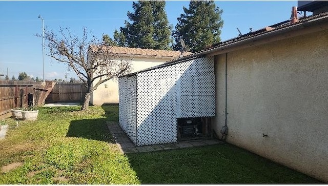 view of home's exterior featuring a lawn