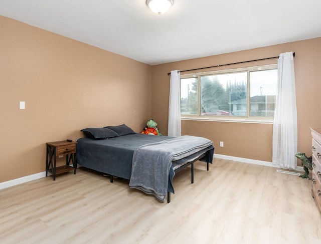 bedroom featuring light hardwood / wood-style flooring