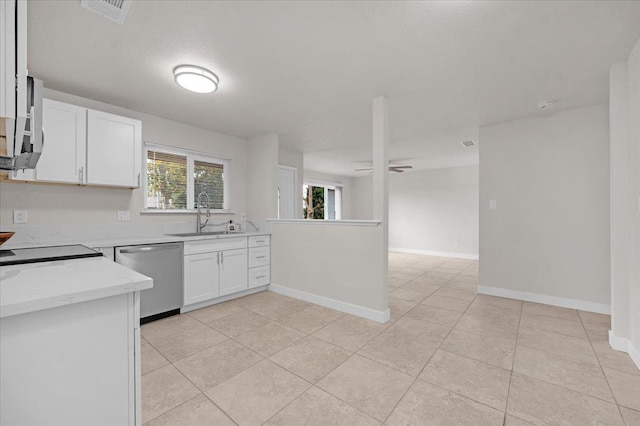 kitchen with visible vents, ceiling fan, stainless steel dishwasher, white cabinetry, and a sink